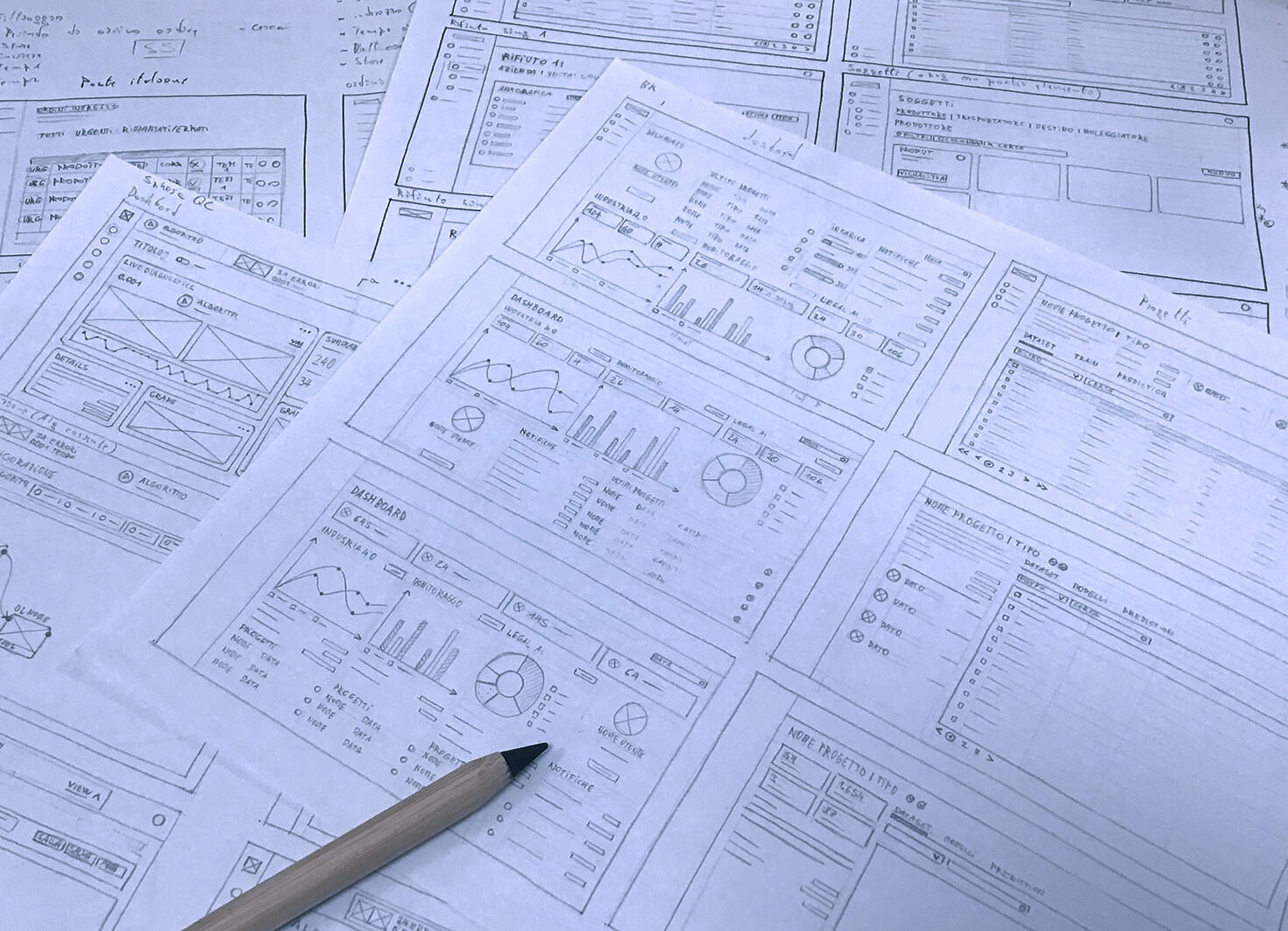 Sketches of interfaces and wireframes created by our UX team